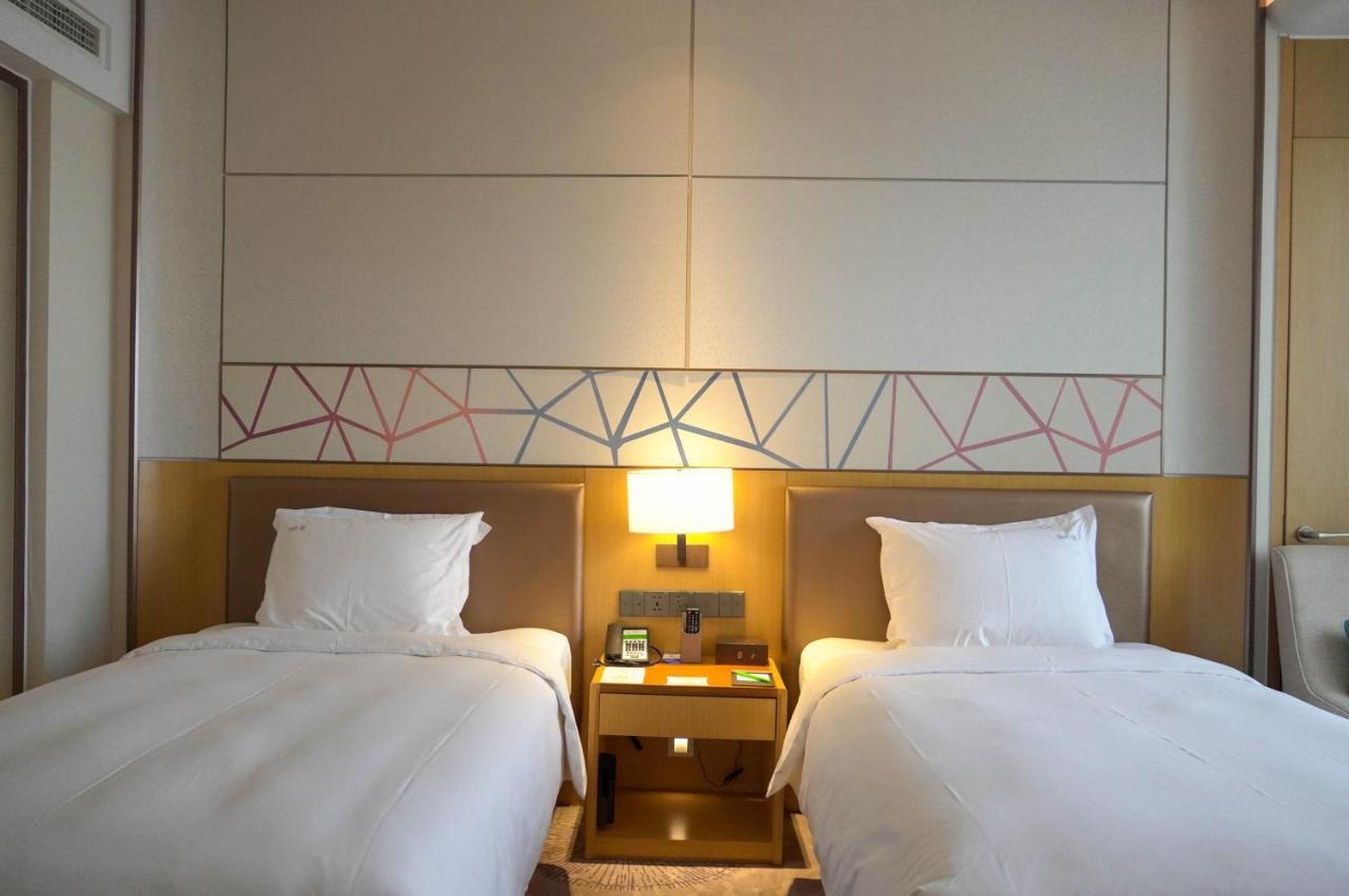 Holiday Inn Tianjin Xiqing By Ihg Exterior photo